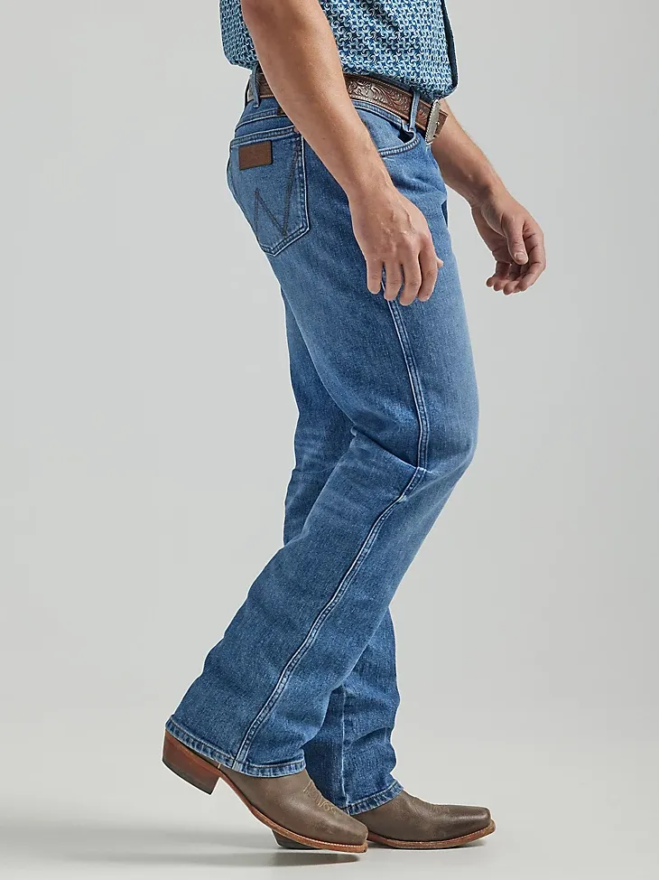 THE WRANGLER RETRO® PREMIUM JEAN: MEN'S SLIM BOOT IN WILD WEST