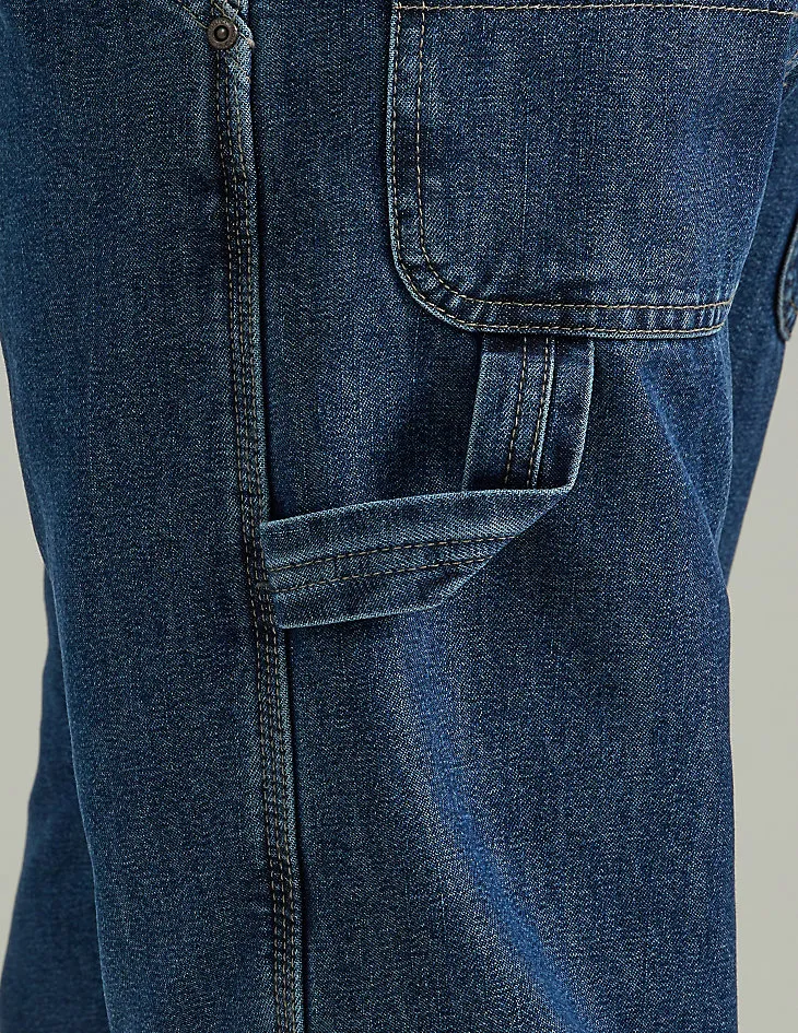 WRANGLER® FLEECE LINED CARPENTER JEAN IN DARK STONEWASH