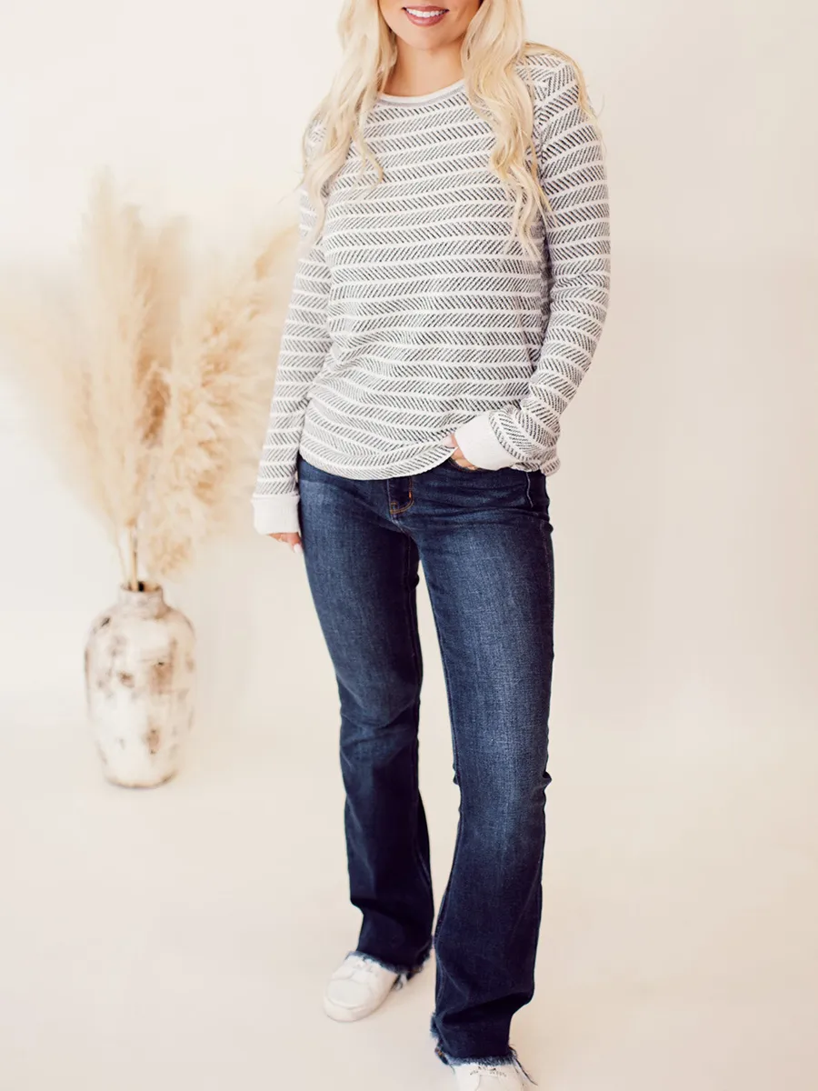 Ivory and dark gray herringbone pattern knitted sweater