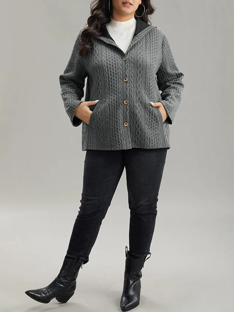 The gray textured jacket has pockets