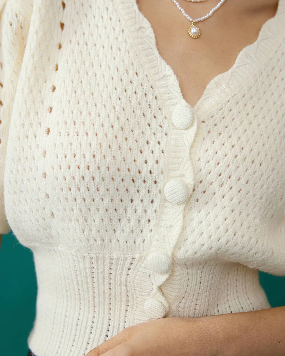 The Short-Sleeve Cutout Knitted Top