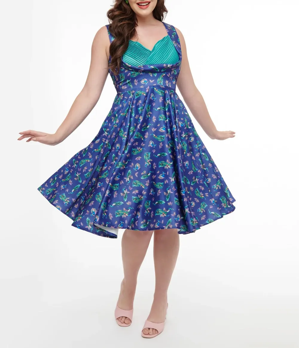 Dolly & Dotty 1950s Purple & Teal Peacock Print Grace Swing Dress