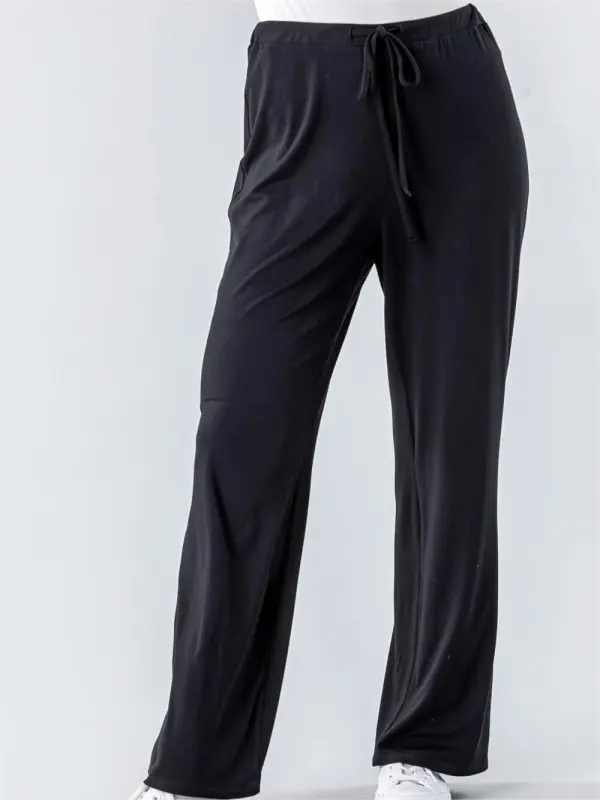 Thin draped black trousers