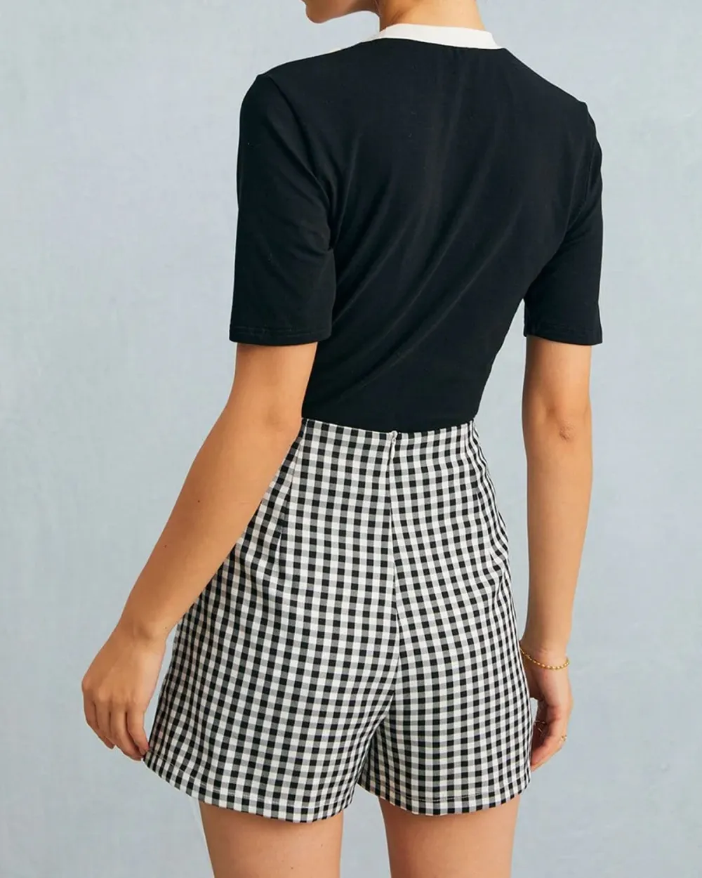 Short black plaid skirt