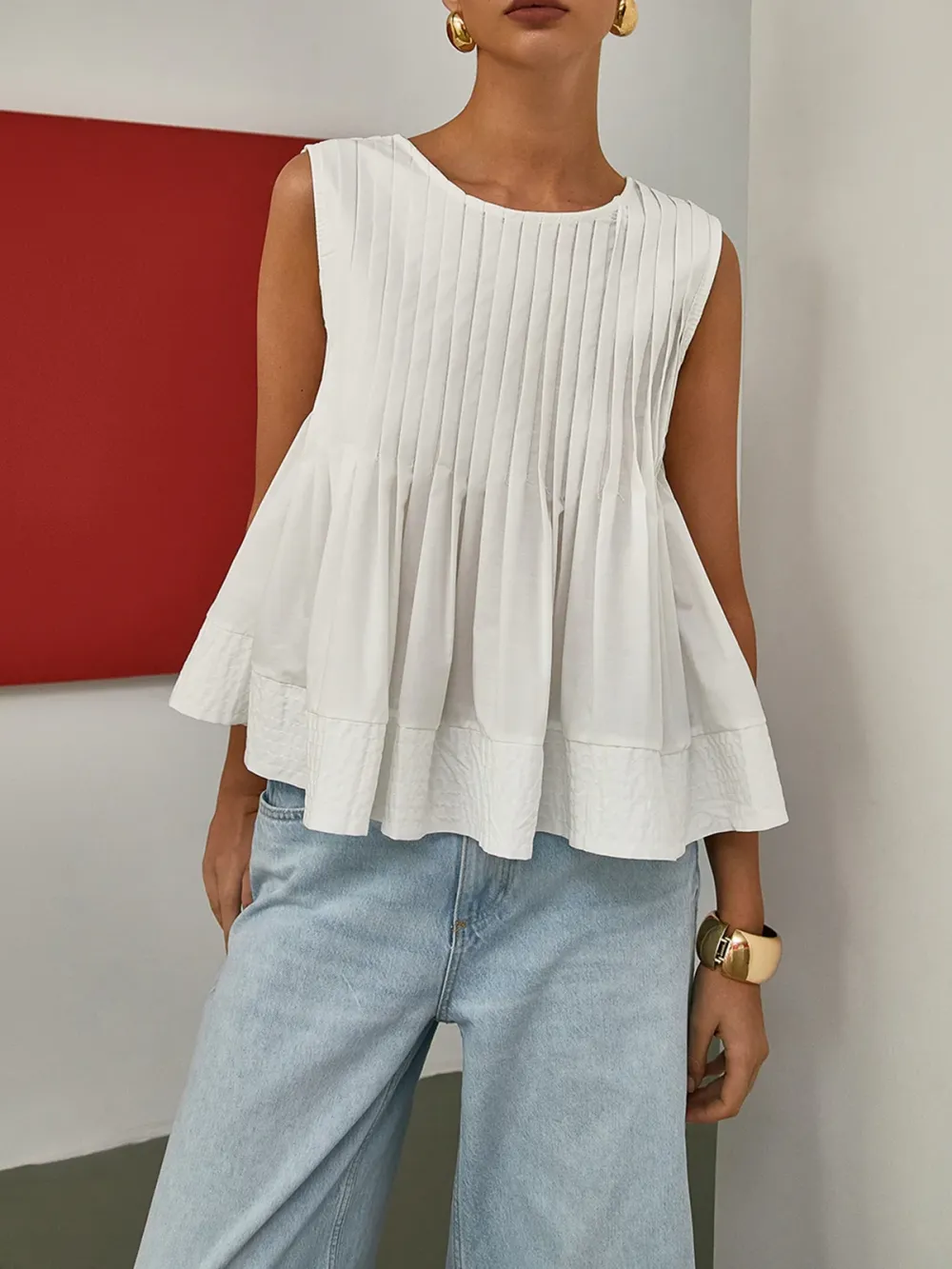 Pleated Peplum Sleeveless Blouse