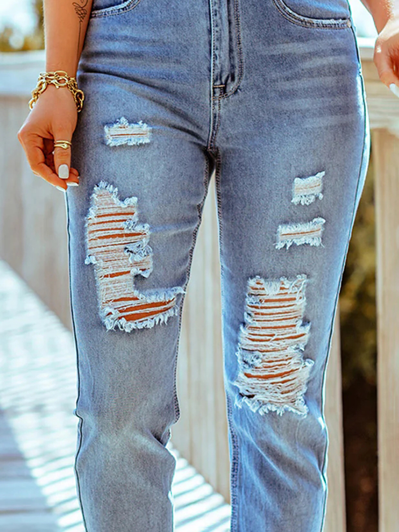 Ladies simple ripped skinny jeans