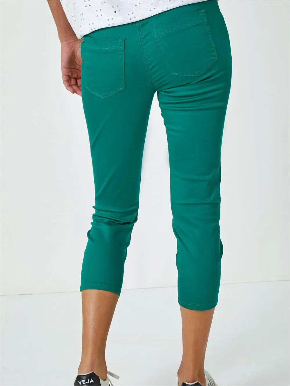 Green skinny trousers